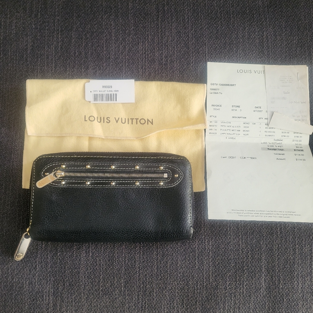 AUTHENTIC Louis Vuittin Suhali Zippy Wallet